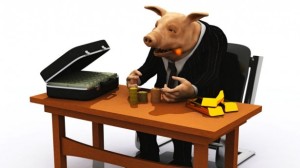 banker-pig-in-suit-counts-his-wealth-via-Shutterstock1-615x345